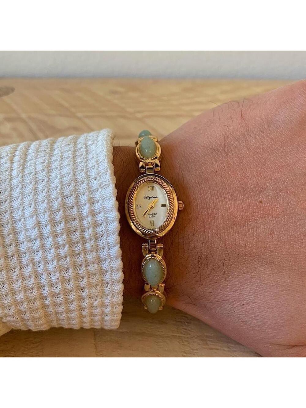 Dainty Gold watch with light blue jade stone opal accents. Item works tell time - Picture 8 of 8